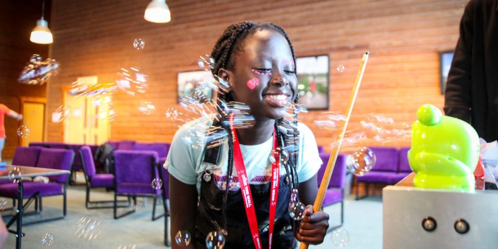 you girl at over the wall camp blowing bubbles