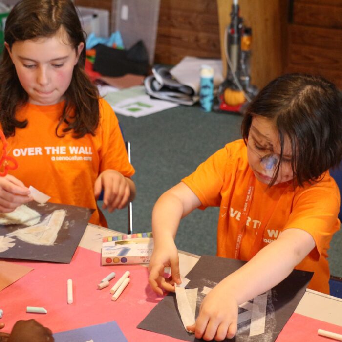 Two campers doing arts and crafts