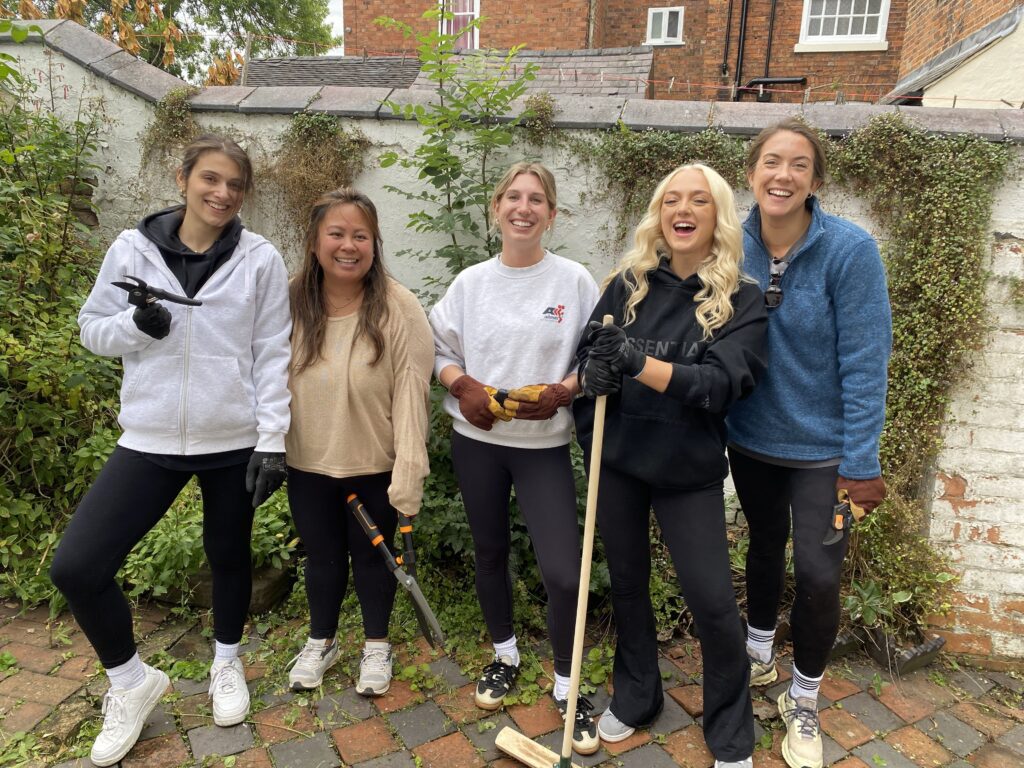 Corporate Volunteers gardening at Ockbrook Campus